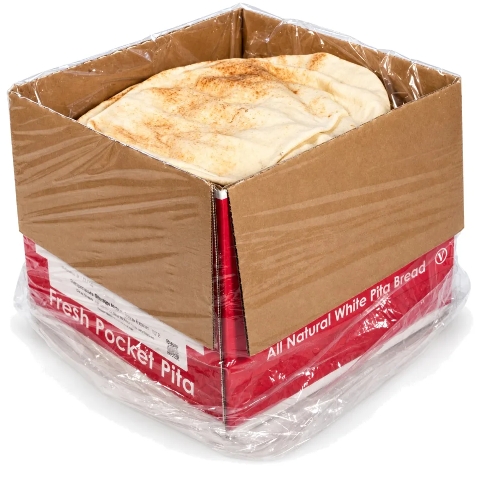 A Cham Bakery foodservice case opened to show a stack of pocket pita inside its clear resealable liner